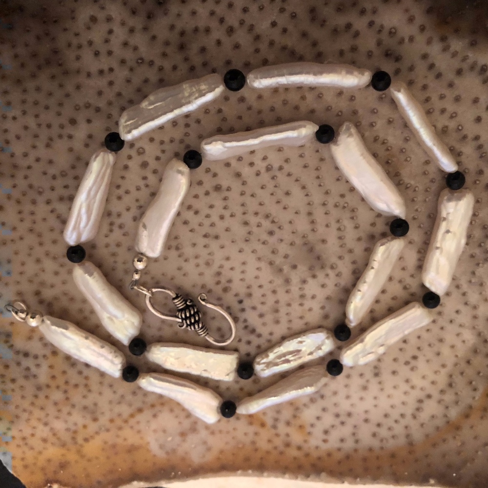 white and black necklace with bonus earrings